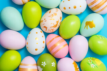 Fototapeta na wymiar Colorful easter eggs background. Alot of painted Easter eggs as background, top view