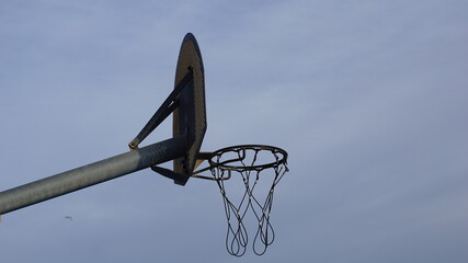 basketball board silhouette against blue background