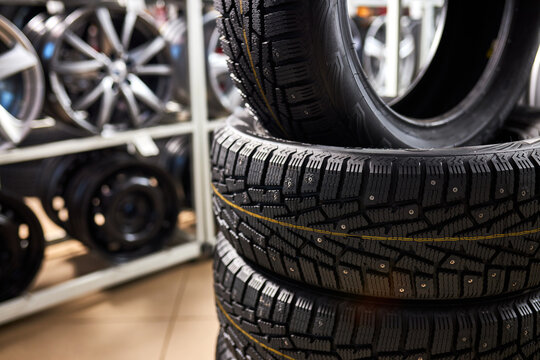 closeup of car tire, replacement of winter and summer tires. cars, automobile concept