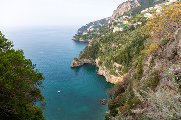 Fototapeta na wymiar Rocky shore in world famous Amalfi coast. Campania, Italy.