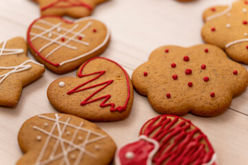 Handmade gingerbread cookies with a pattern on a wooden surface