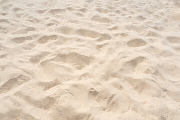 Naklejka na ściany i meble Sand nature texture in summer beach as background.
