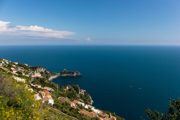 Naklejka na ściany i meble Rocky shore in world famous Amalfi coast. Unesco World heritage site. Campania, Italy.