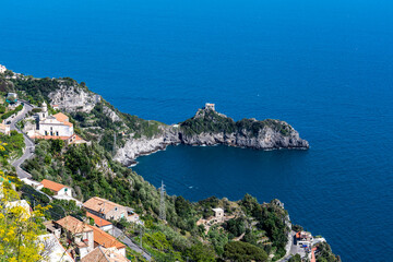 Fototapeta na wymiar Rocky shore in world famous Amalfi coast. Unesco World heritage site. Campania, Italy.