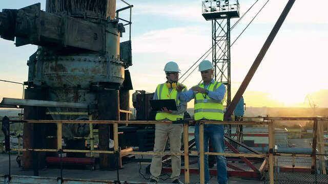 Engineering colleagues are planning a project in the construction zone
