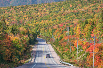 Fototapeta premium Canada, Nova Scotia, Cabot Trail. Neils Harbour, Cape Breton Highlands National Park, Highway 6 in autumn.