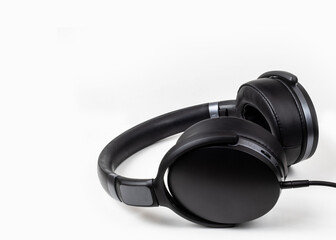 black headphones on white background