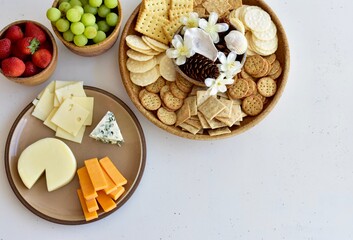 Gourmet wine and cheese charcuterie platter ordering out from restaurant for romantic date night at home on special occasion holiday or birthday. Photo concept, food lifestyle, background, close-up