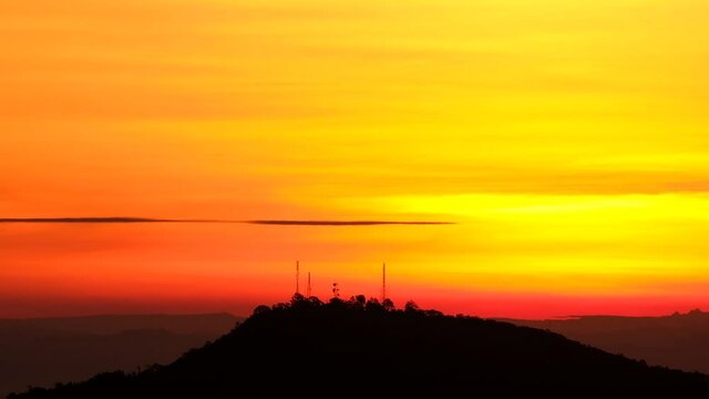 Telecom Towers On A Mountain In Thailand Against A Background Of Beautiful Golden Sunset . View Of Warm Yellow And Red Orange Sky - Wide Shot