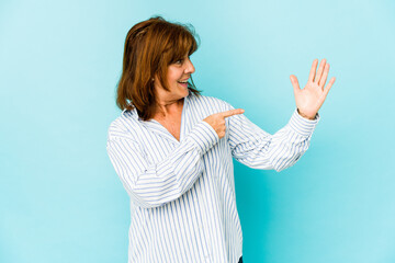 Senior caucasian woman isolated smiling cheerful showing number five with fingers.