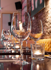 Closeup of glasses on a restaurant table.