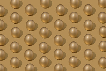 Golden Easter eggs artistically photographed on gold background forming a pattern