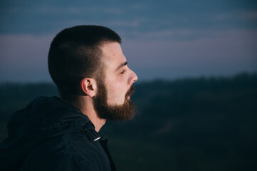 guy on the background of the sky