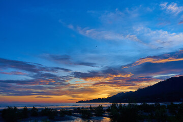 Colorful sunset on an island in the tropics
