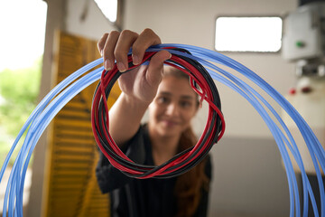 Portrait woman in her workshop mechanics.