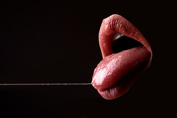 Fototapeta Closeup erotic mouth. Woman sexy tongue. Desire, sensual seductive. obraz
