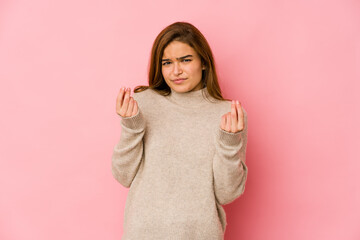 Young skinny caucasian teenager girl showing that she has no money.