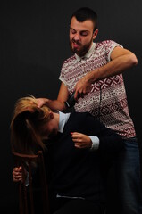 man shaves Woman