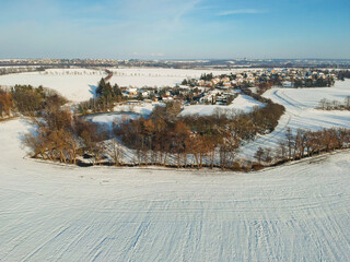 Lipany, Czech republic - January 11, 2021. Aerial view of village in winter under snow