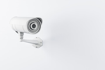 CCTV videocam installed on light wall, security concept