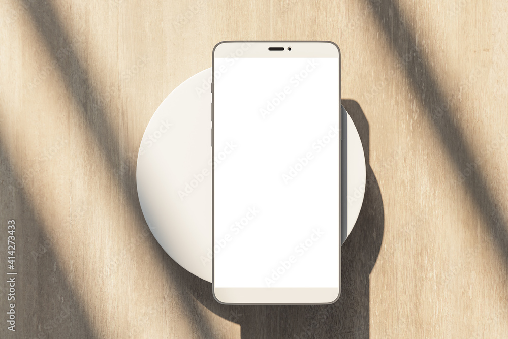 Poster blank white cell phone display on white cylinder at abstract sunny wooden background. realistic cell
