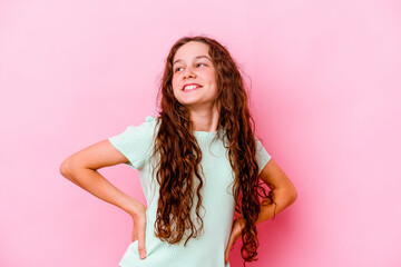 Little caucasian girl isolated on pink background relaxed and happy laughing, neck stretched showing teeth.