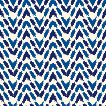 Ethnic seamless pattern. Freehand horizontal zigzag chevron stripes print. Boho chic, indigenous, tribal background