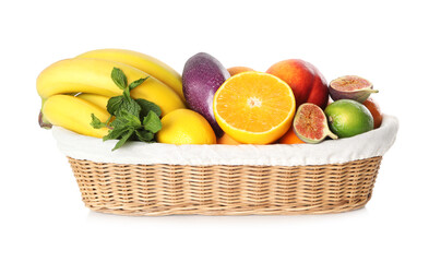 Assortment of fresh exotic fruits in basket on white background