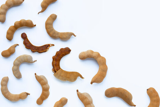 Tamarind tropical fruit on white background. Top view