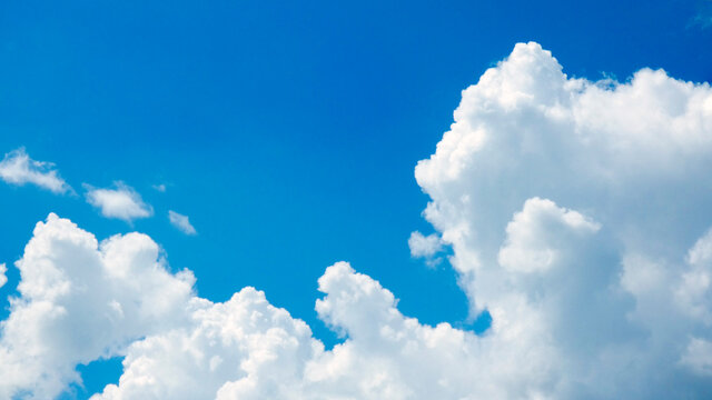 Blue sky with white beautiful clouds in a sunny day picture image background photography