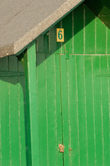 Green wooden beach hut isle of wight close up