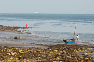 Boat low tide on beach bembridge isle of wight