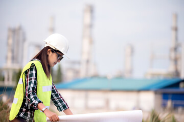 Asian engineer on construction site check documents plan on construction site ,Industry ,Engineer...