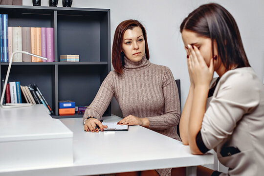 Appointment with a psychologist. Psychological problems of girl. Woman is crying. The process of psychological correction of personality. Help for those in need. Mental help concept