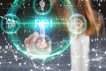 Business, Technology, Internet and network concept. Young businessman working on a virtual screen of the future and sees the inscription: ROI