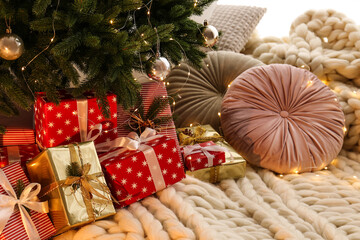 Naklejka na ściany i meble Beautiful Christmas tree and gift boxes in room