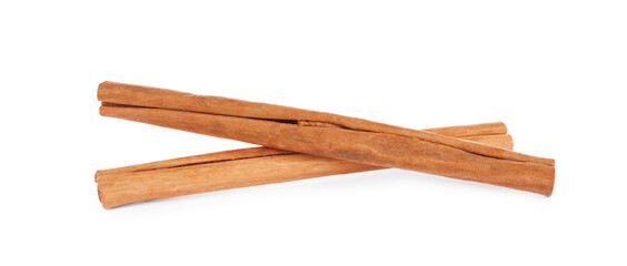 Aromatic brown cinnamon sticks on white background