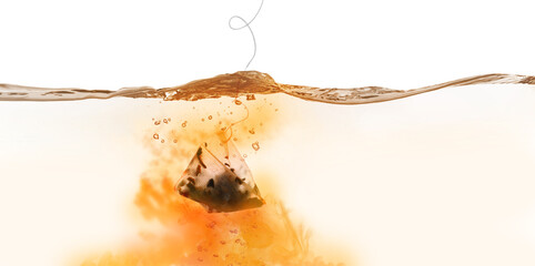 Dipping of tea bag into hot water against white background, banner design
