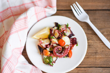 Octopus salad with herb vegetables, Fresh and healthy salad seafood squid octopus tentacles