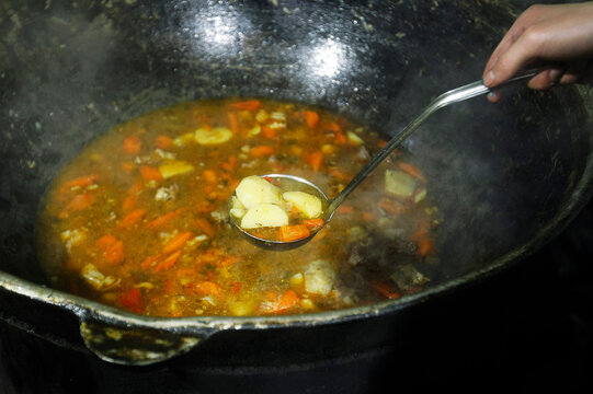 Scoop With Soup Closeup, Cooking Iftar Meal Closeup