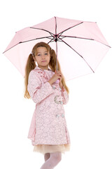 Beautiful teenage girl under pink umbrella