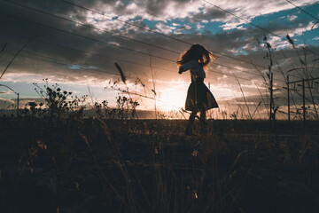 silhouette of a girl dancing