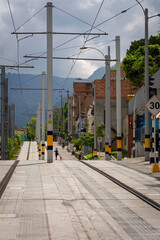 Fototapeta na wymiar Medellín, Antioquia, Colombia - May 14, 2019. The Medellín tramway is a means of urban, electric, and passenger rail transportation that operates in the city of Medellín.