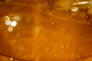 Oxygen bubbles in skin care product, close-up. Hyaluronic acid or shower gel enriched with oxygen....