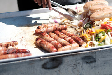 hot dogs on the grill