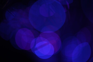 Blur and bokeh, vibrant colors. and textured. Lights on blue. Christmas luxury fresh elegant bokeh background.