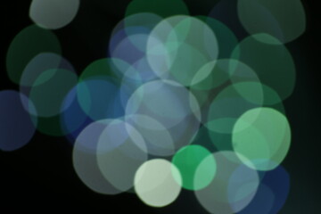 Blur and bokeh, vibrant colors. and textured. Lights on blue. Christmas luxury fresh elegant bokeh background.