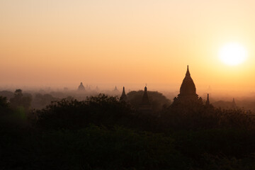 Fototapeta na wymiar sunset landscape with pagoda in Myanmar