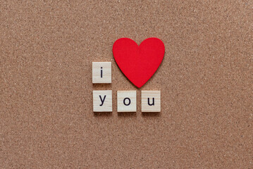 I love you wooden letters on cork board red heart