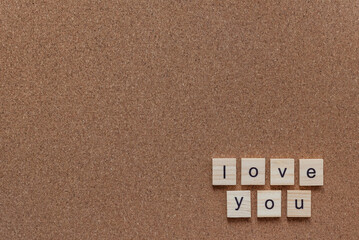 love you wooden letters on cork board